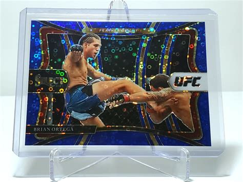 2021 Panini Select UFC Premier Level Blue Prizm 173 Brian Ortega 49