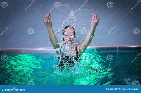 Beautiful Woman Splashing Water In Swimming Pool Stock Image Image