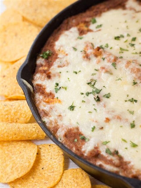 Cheesy Refried Beans Casserole (Side Dish or Dip!) - Borrowed Bites