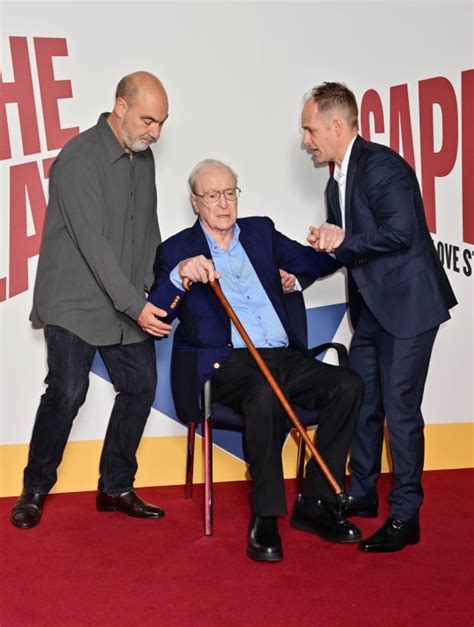 Sir Michael Caine 90 Helped Onto Red Carpet During Rare Appearance