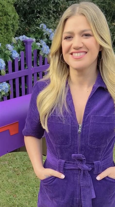 Kelly Clarkson Rocks Tight Purple Catsuit That Leaves Fans Drooling As