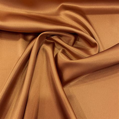 Tissu caddy crêpe envers satin stretch beige caramel Tissus en Ligne