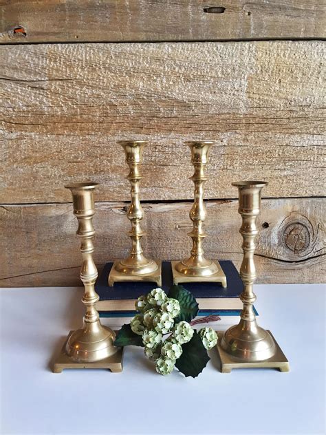 Four Heavy Brass Candle Holders Brass Candlesticks Etsy Brass Candle Candle Holders