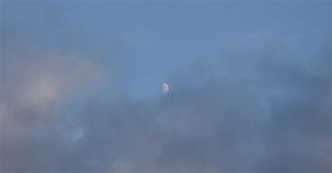 Crescent Moon behind Clouds · Free Stock Photo