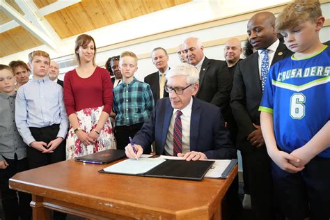 Governor Evers Signs Legislation To Increase Penalties For Carjacking And Reckless Driving In