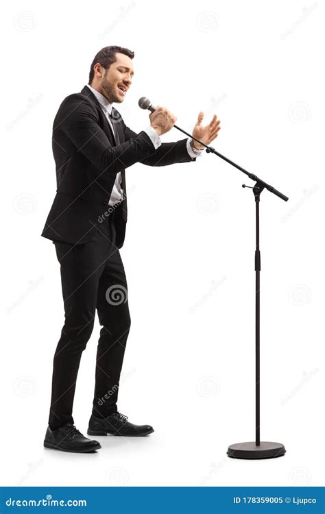 Elegant Male Singer Singing On A Microphone Stock Image Image Of