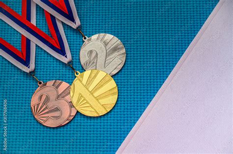 Medal ceremony concept photo. Blue background, white edit space. Original wallpaper for summer ...