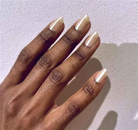 Designs For Nude Nails For Dark Skin That Are Trending Right Now
