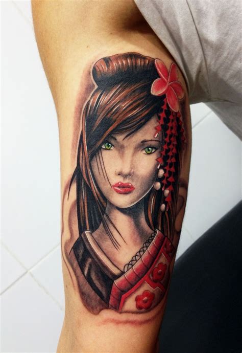 Nice looking colored biceps tattoo of beautiful woman with flower - Tattooimages.biz