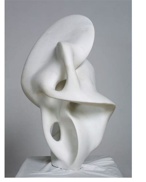 A White Sculpture Sitting On Top Of A Table