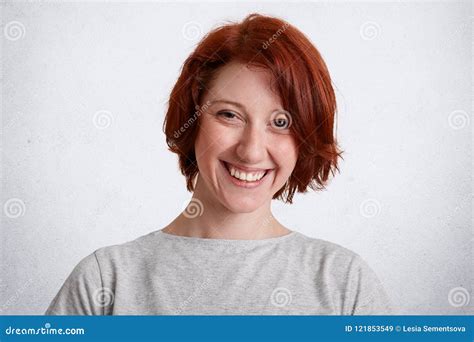 Smiling Joyful Young Female Housewife Has Broad Smile Happy To Recieve Compliment From Husband