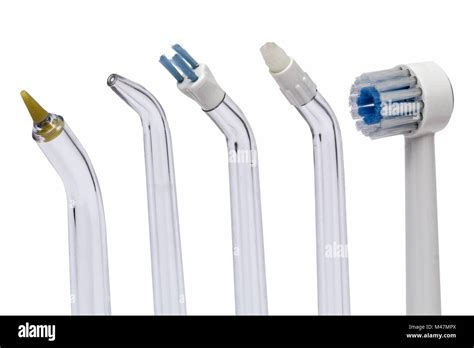 Tools for dental cleaning, isolated on white background Stock Photo - Alamy