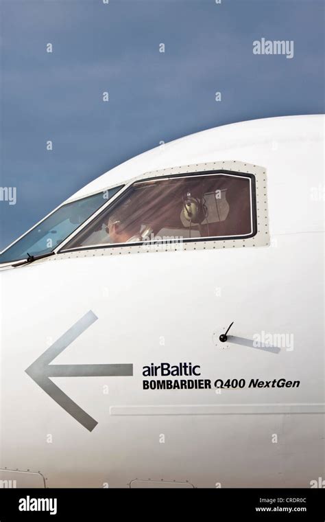 Cockpit of an Air Baltic Bombardier Q 400 Next Gen aircraft Stock Photo ...