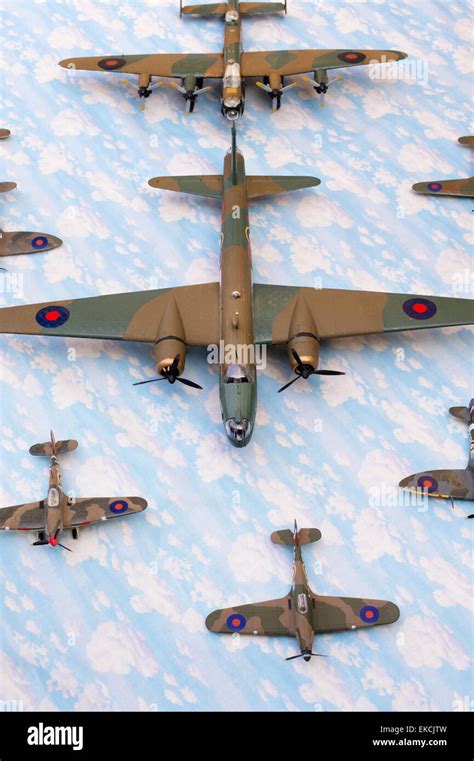 WW2 British Airfix model army planes on a sky cloud material background ...