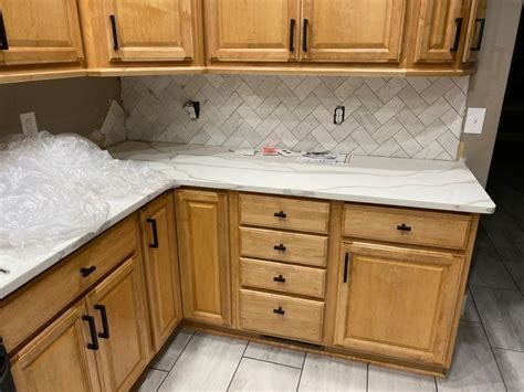 Lightwhite Countertops With Natural Maple Cabinets Picture Request