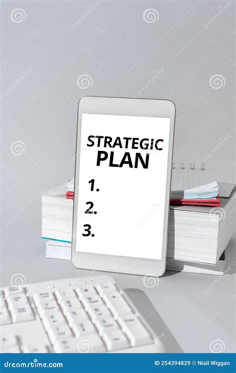 Hand Writing Sign Strategic Plana Process Of Defining Strategy And