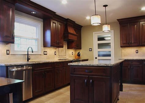 This Kitchen Remodel Included Dark Brown Wooden Cabinets Paired With