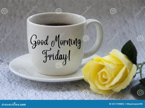 Good Morning Friday Text On Coffee Cup Yellow Flower On Blurred Marble