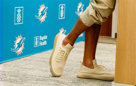 What Miami Dolphins Coach Mike McDaniel Wears Is As Much Of A Surprise