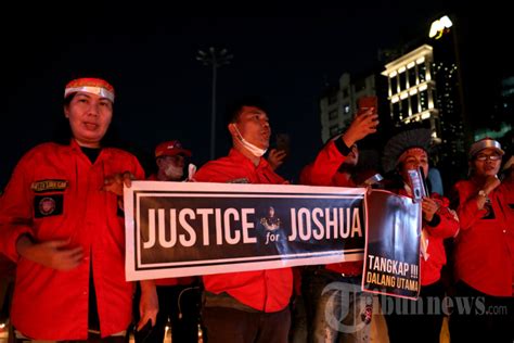 Aksi Mengenang Hari Kematian Brigadir J Foto