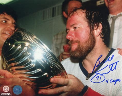 Billy Smith drinks from the Stanley Cup 1983 | HockeyGods