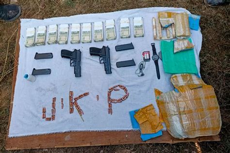 J K Police Recovers Weapons Cash Dropped By Pak Drone