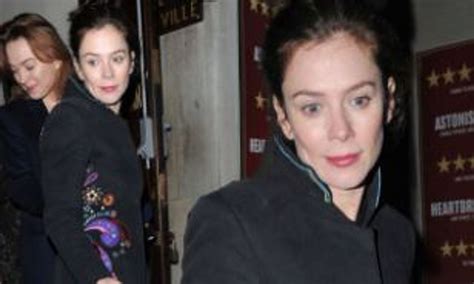 Anna Friel Lights Up A Cold Winter Night In A Colourful Coat While Leaving The Theatre Winter