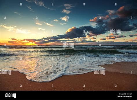 Beautiful Cloudscape Over The Sea Sunrise Shot Stock Photo Alamy