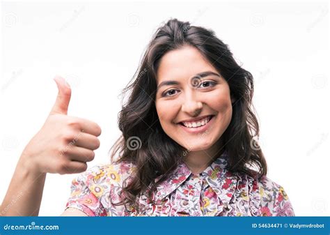 Mujer Joven Feliz Que Muestra El Pulgar Para Arriba Imagen De Archivo