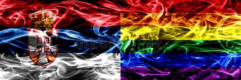 Serbia Vs Gay Pride Smoke Flags Placed Side By Side Thick Color Stock