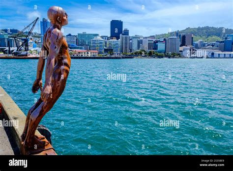 Solace in The Wind The Naked Man bronze statue by British artist Max Patté waterfront walk