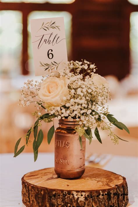 Simple But Elegant Mason Jar Centerpieces On Wood Rounds Rustic Rose