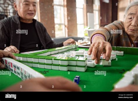 Happy Old People Playing Mahjong Stock Photo Alamy