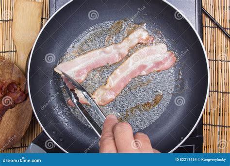 Chef Frying Bacon In The Pan Stock Photo Image Of Color Closeup