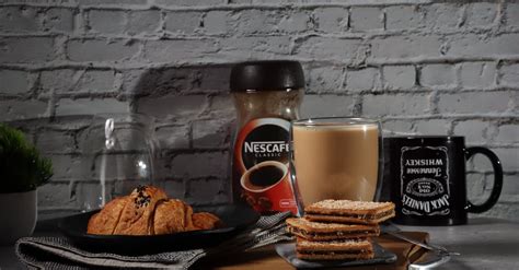 Cup of Coffee and Chocolate Sandwiches · Free Stock Photo