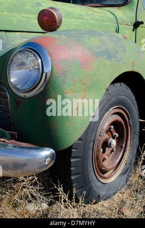 An Old Antique Truck Rusts Slowly In A Mountain Field It S Grille And