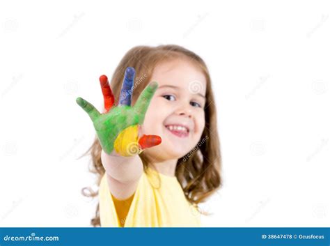 Petite Fille Heureuse Avec Des Mains Peintes En Couleurs Photo Stock