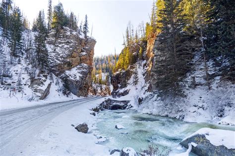 The Road And River Pass Through Rocks Beautiful Winter Landscape Stock