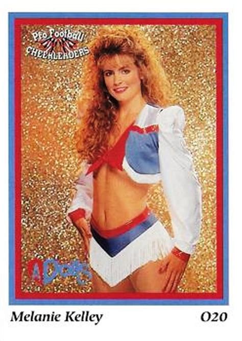 A Woman In A Cheerleader Uniform Posing For A Photo On A Card With The