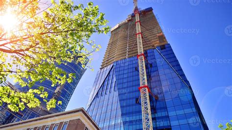 High Rise Building Under Construction Installation Of Glass Facade