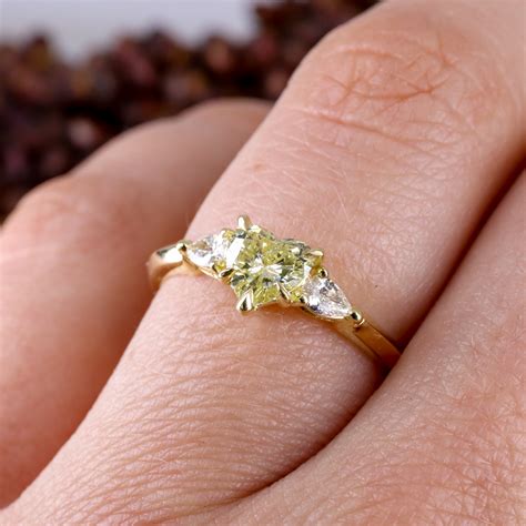 18ct Yellow Gold Heart Shape Pale Yellow Diamond Trilogy Ring With