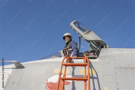 Military pilot in the cockpit of a jet aircraft Stock Photo | Adobe Stock