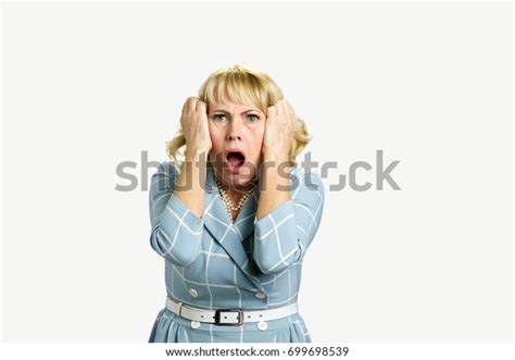 Horrified Shocked Mature Woman Portrait Stressed Stock Photo 699698539