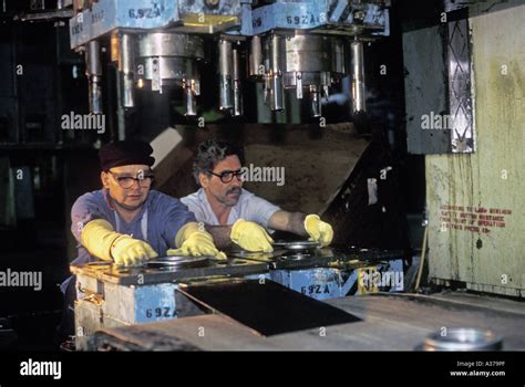 Detroit Michigan Stamping Press Operators Make Auto Parts At Hermes