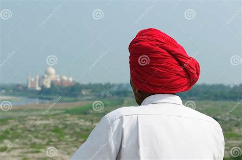 The Indian In The Turban Is Looking From Red Fort On Taj Mahal