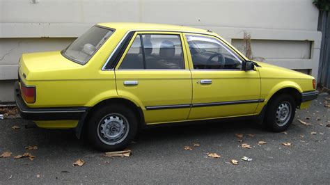 Aussie Old Parked Cars 1986 Mazda Bf 323 16 Sedan