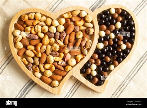 Mixed nuts and chocolate balls Stock Photo - Alamy