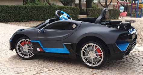 Coche eléctrico infantil Bugatti Divo 12V gris negro y celeste KI4