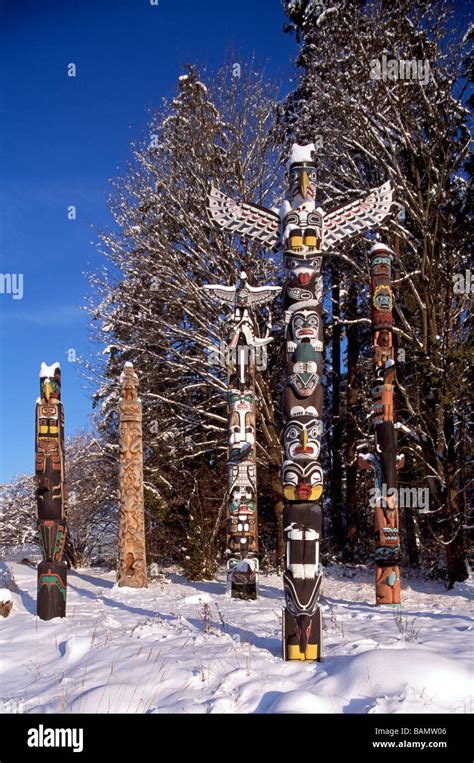 Snow Covered Totem Poles In Winter At Brockton Point In Stanley Park