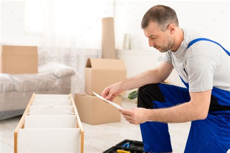 Handyman Reading Instruction Installing Cabinet Assembling And Fixing